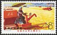 China, 1975. Woman driving harvester combine. Sc. 1244.